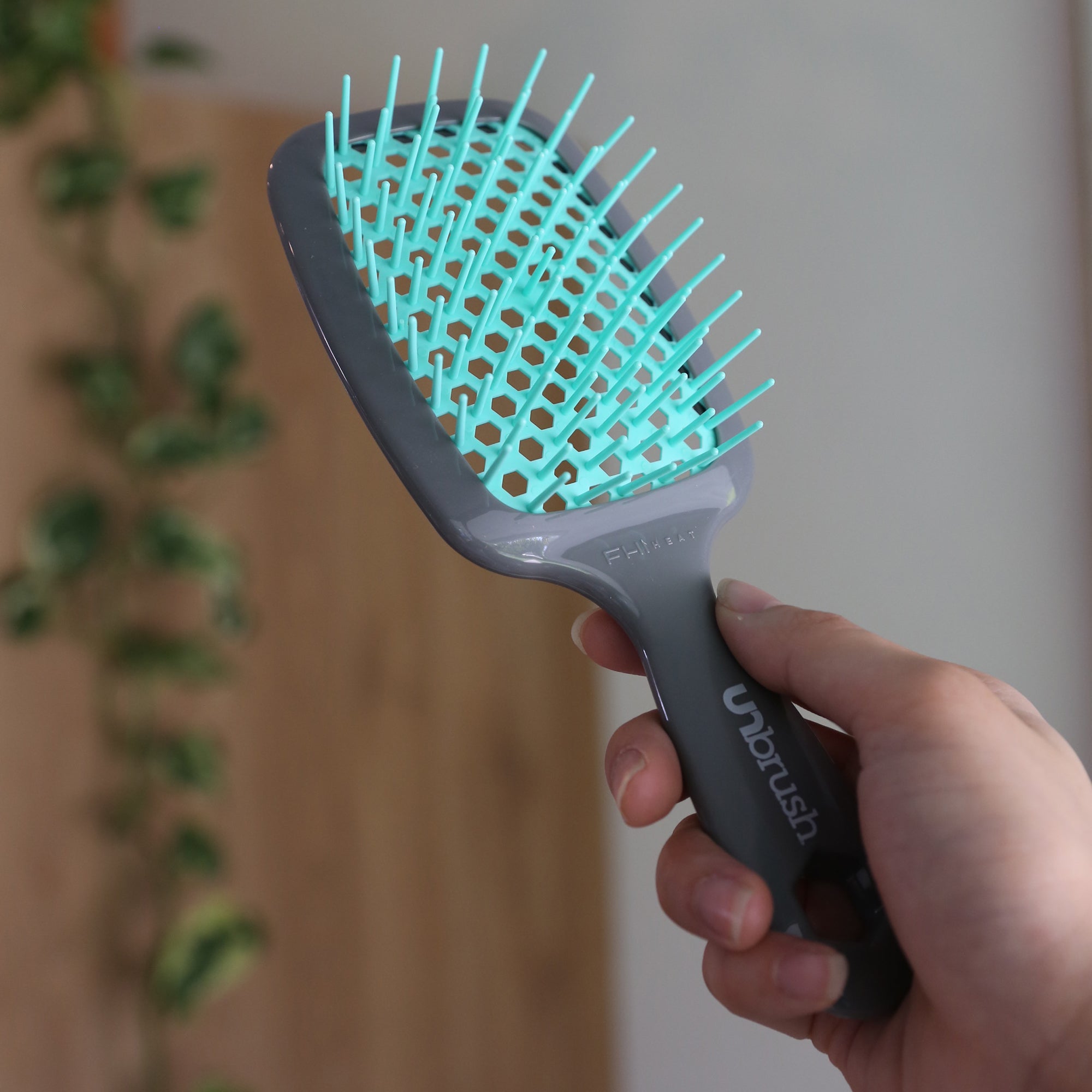 Unbrush teal grey handle lifestyle