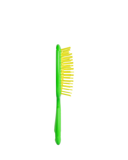 Side view of Vibrant Green Unbrush Mini detangling brush with vibrant yellow hexagon bristle pattern, designed for gentle use on wet or dry hair.