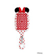 Front view of a white Minnie Mouse-themed UNbrush with red polka dots, red bow, and Mickey head pattern on the brush pad.