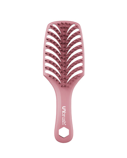 Pink hairbrush with Ubrush branding on a white background