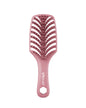 Pink hairbrush with Ubrush branding on a white background